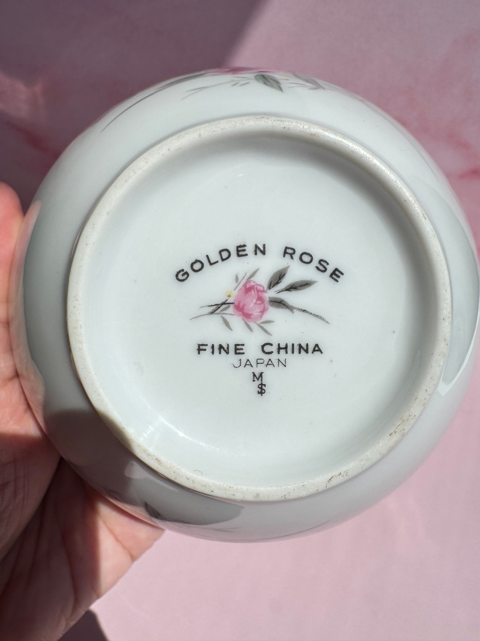 The base of the Porcelain Floral Sugar Bowl displays the inscription "GOLDEN ROSE FINE CHINA JAPAN M$" alongside a central pink rose illustration, embodying the timeless elegance of vintage Japanese craftsmanship.