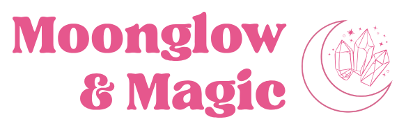 Pink text reading "Moonglow & Magic" beside a crescent moon with three crystals and small stars inside the curve, on a light background.